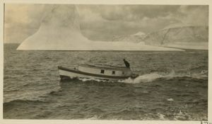 Image of Power Boat- George Borup running by berg